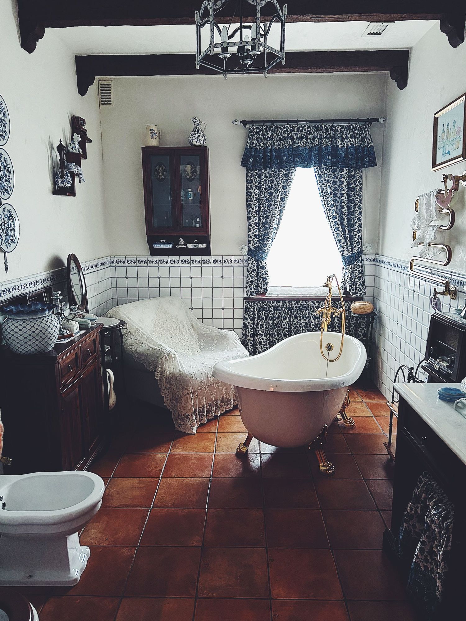 A roll-top bath under low beams